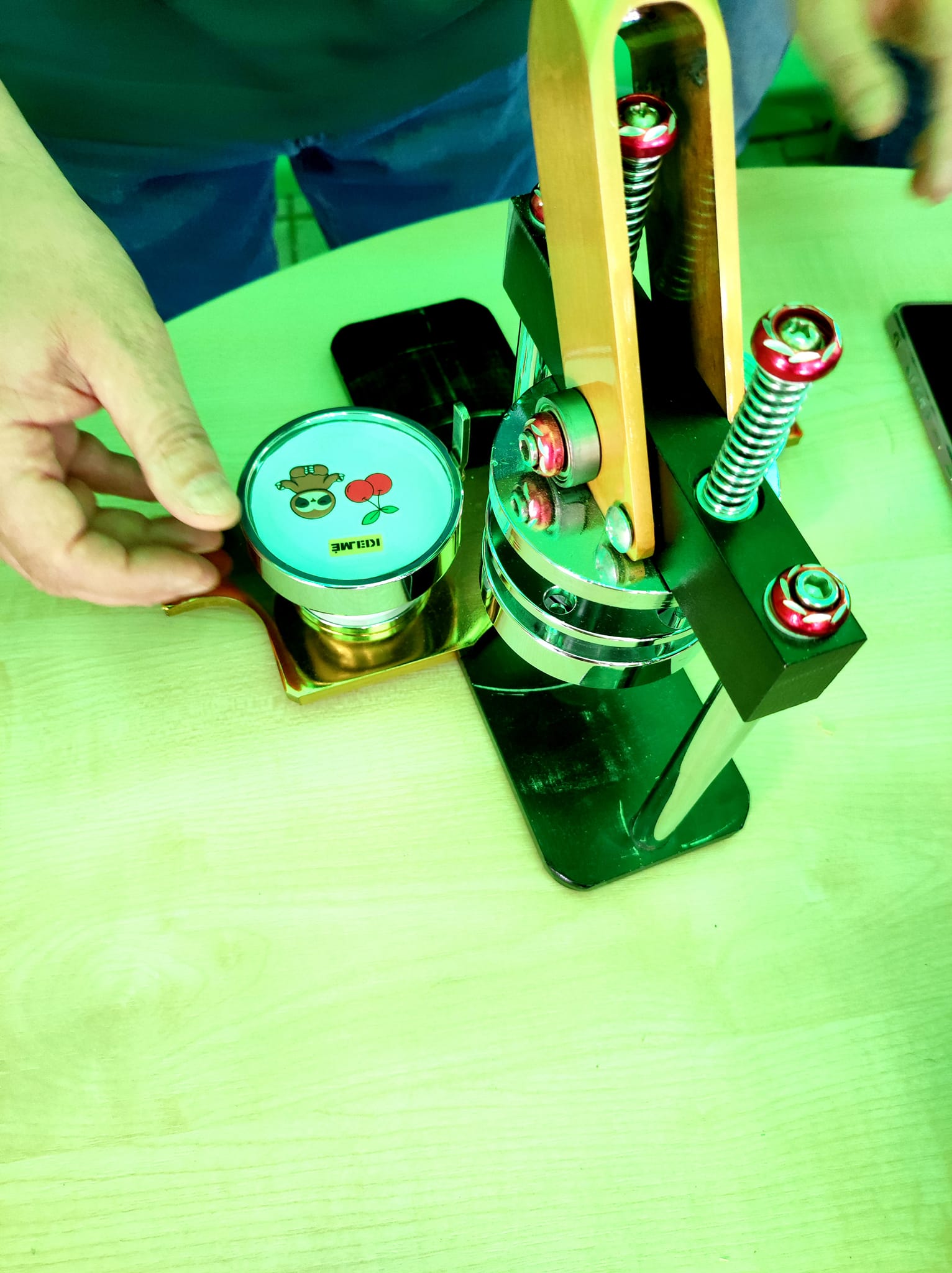 Badge-making machine and participants’ work