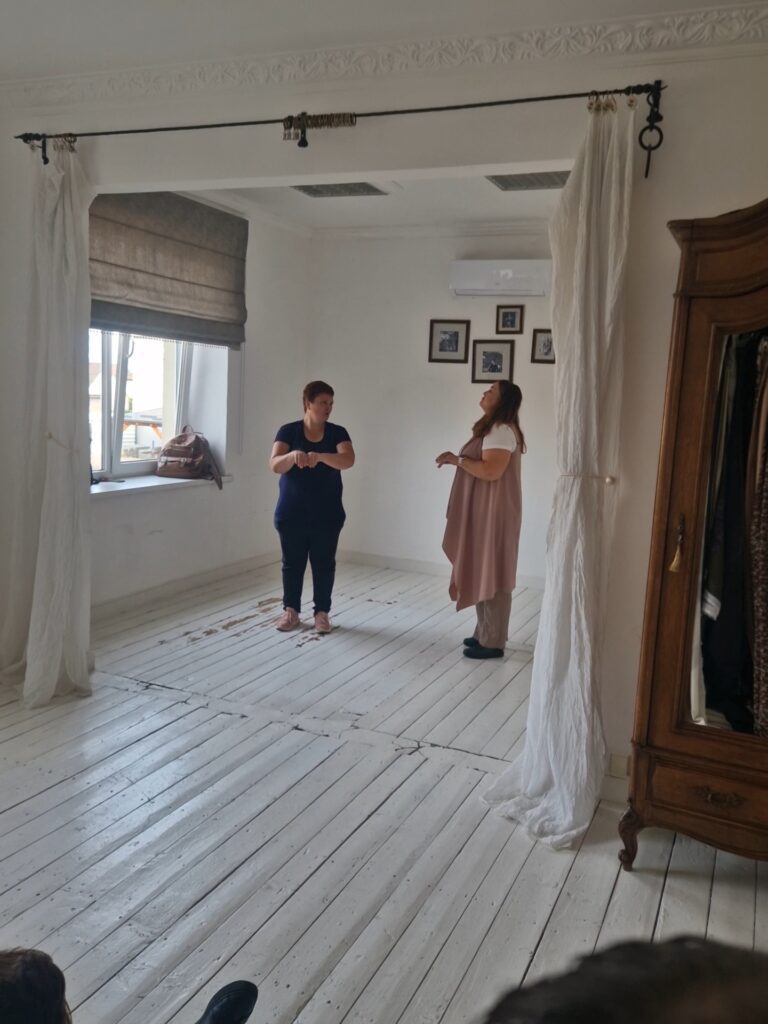 The participants are doing a dialogue exercise in the theatre studio
